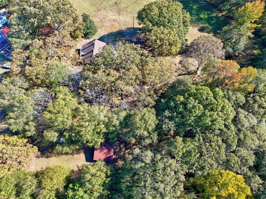 0 Cromer Road, Unit 245 CROMER ROAD Williamston, SC 29697 - Photo 9 of 24 An aerial view showcases a residence nestled among expansive tree-filled grounds.