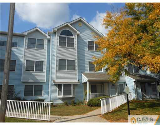 415 Edpas Road New Brunswick, NJ 08901 - Photo 1 of 5 a front view of a house with glass windows