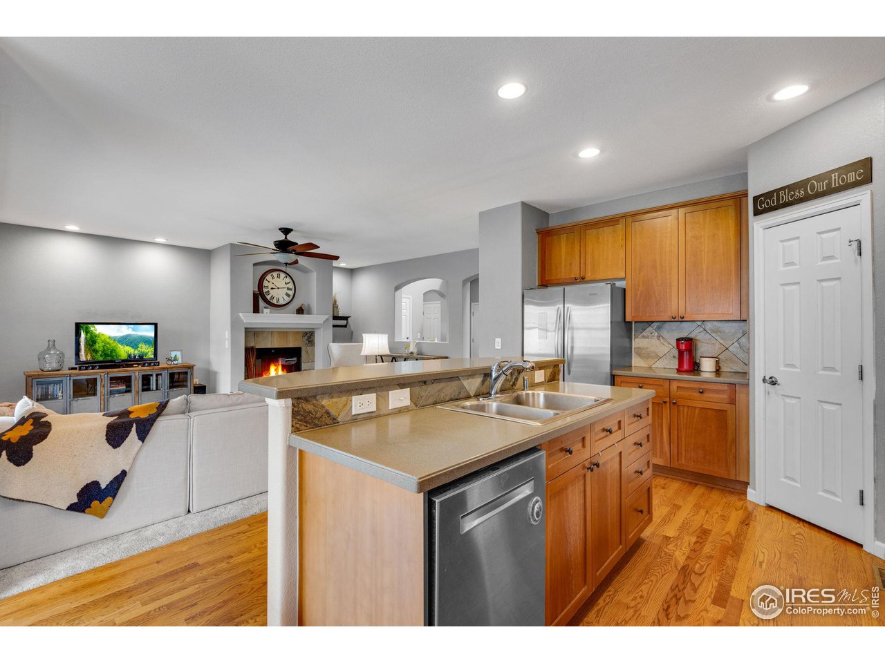 4115 Frederick Circle Longmont, CO 80503 - Photo 13 of 39 a kitchen with a sink a stove and cabinets