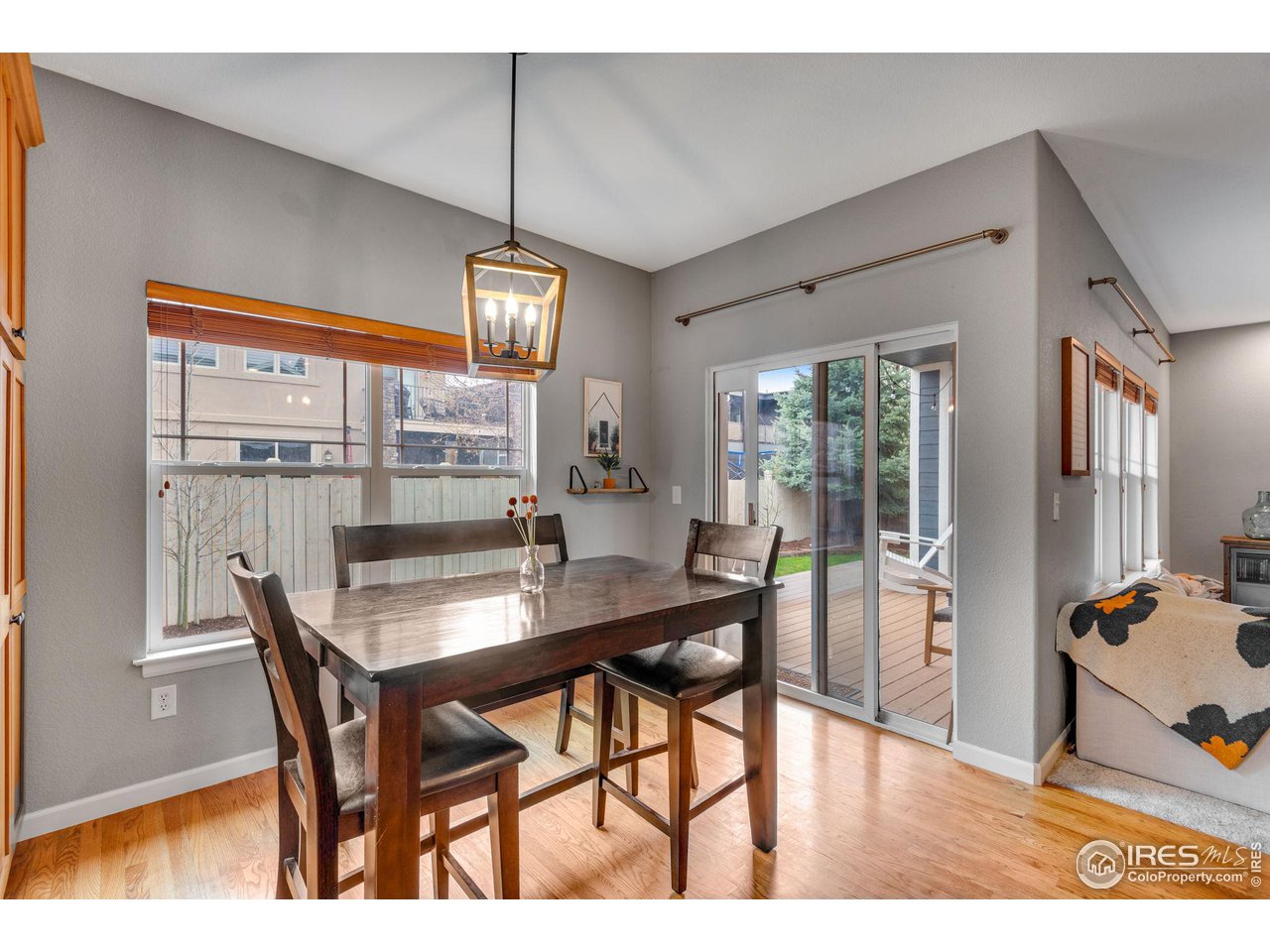 4115 Frederick Circle Longmont, CO 80503 - Photo 15 of 39 a dining room with furniture and window