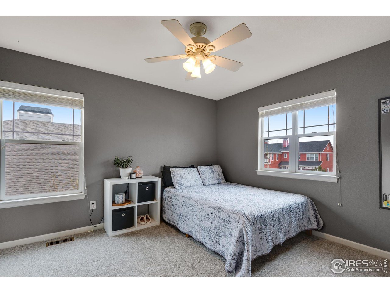 4115 Frederick Circle Longmont, CO 80503 - Photo 29 of 39 a bedroom with a bed and a window