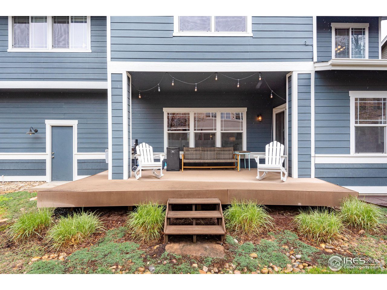 4115 Frederick Circle Longmont, CO 80503 - Photo 35 of 39 a front view of a house with a yard