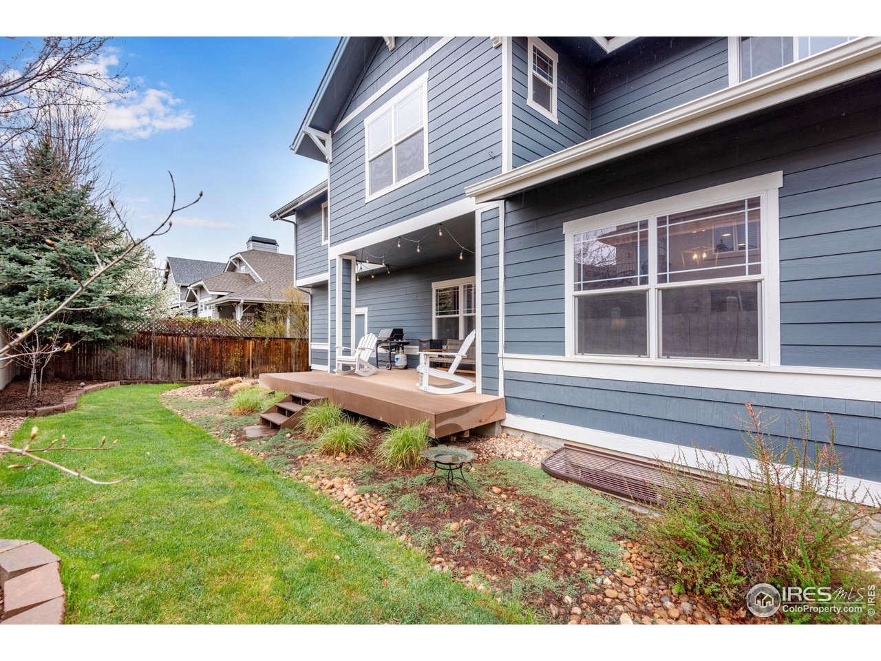 4115 Frederick Circle Longmont, CO 80503 - Photo 38 of 39 a view of a house with backyard and sitting area