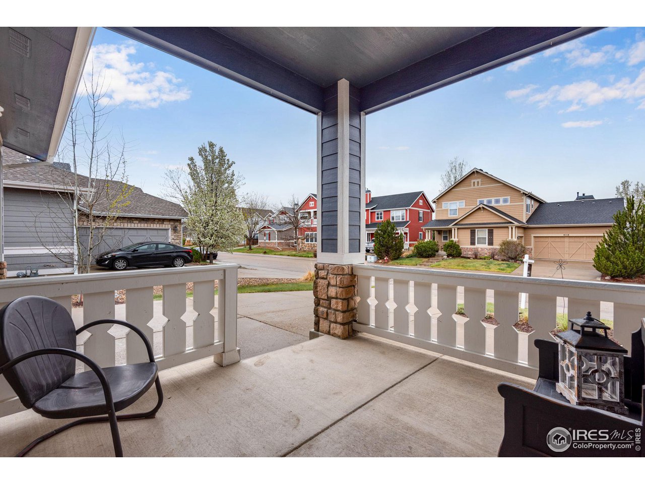 4115 Frederick Circle Longmont, CO 80503 - Photo 4 of 39 a view of a chairs and table in the balcony