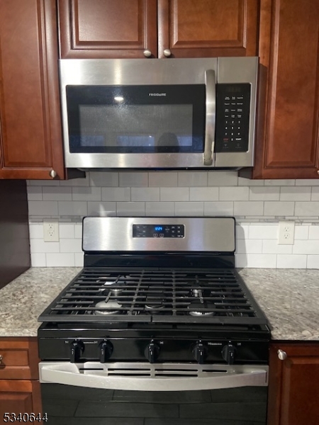 455 South 14th Street, Unit 3 Newark, NJ 07103 - Photo 5 of 10 a stove top oven sitting inside of a kitchen
