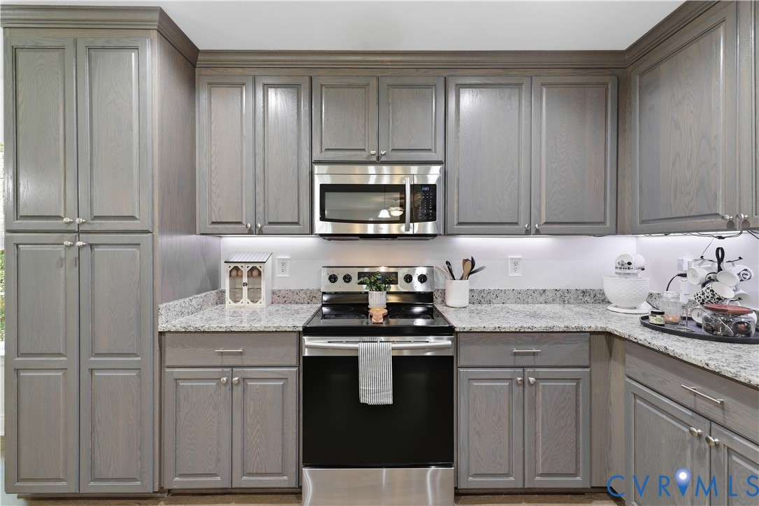 222 Oak Ridge Court Aylett, VA 23009 - Photo 11 of 35 Kitchen featuring gray wood-finish cabinetry with