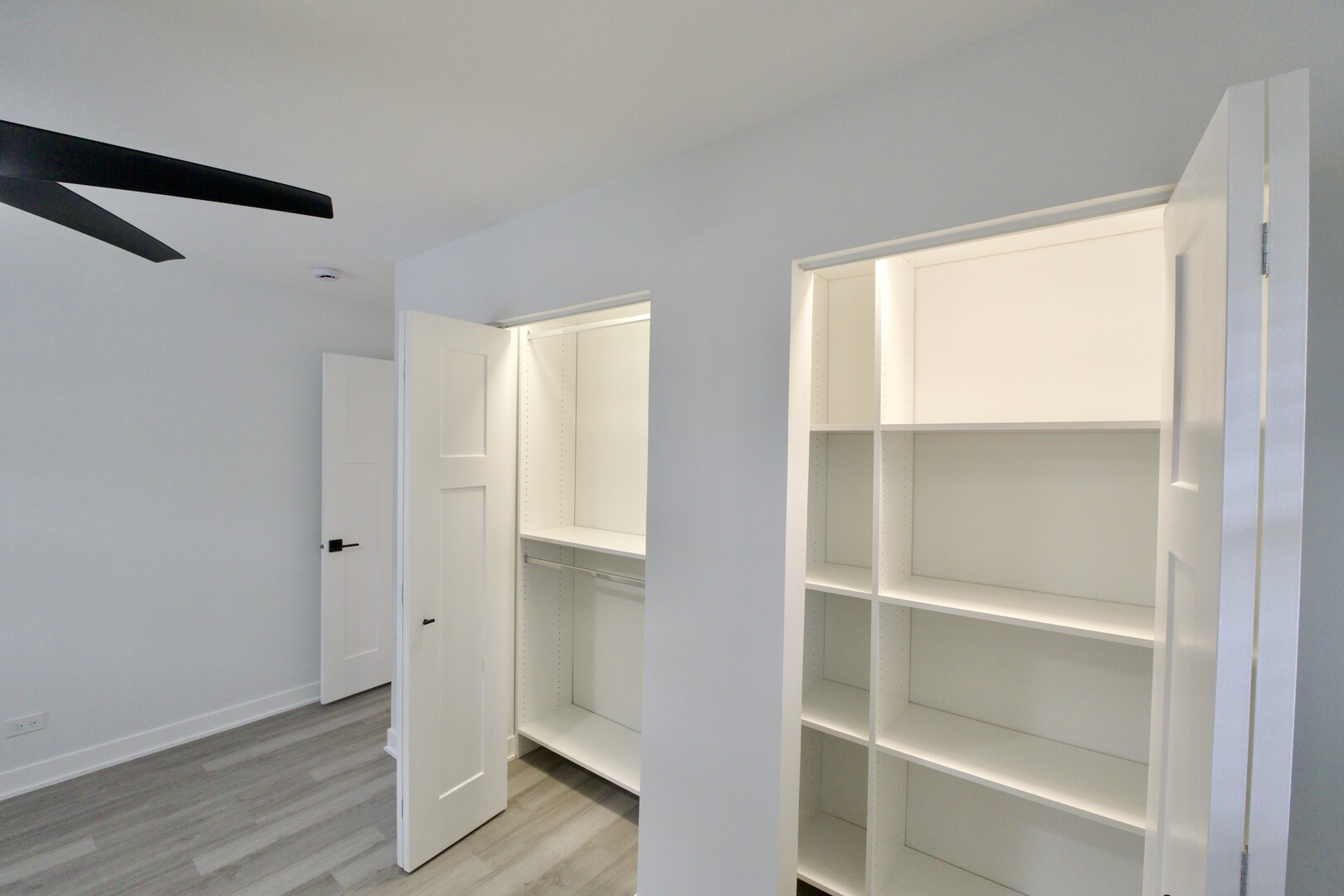 1406 Ridgeway Street Round Lake Beach, IL 60073 - Photo 17 of 33 a view of walk in closet with empty racks