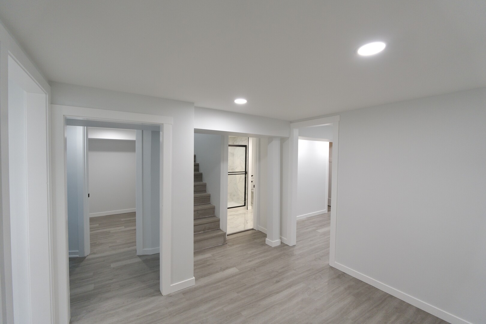 1406 Ridgeway Street Round Lake Beach, IL 60073 - Photo 23 of 33 a view of an empty room with wooden floor