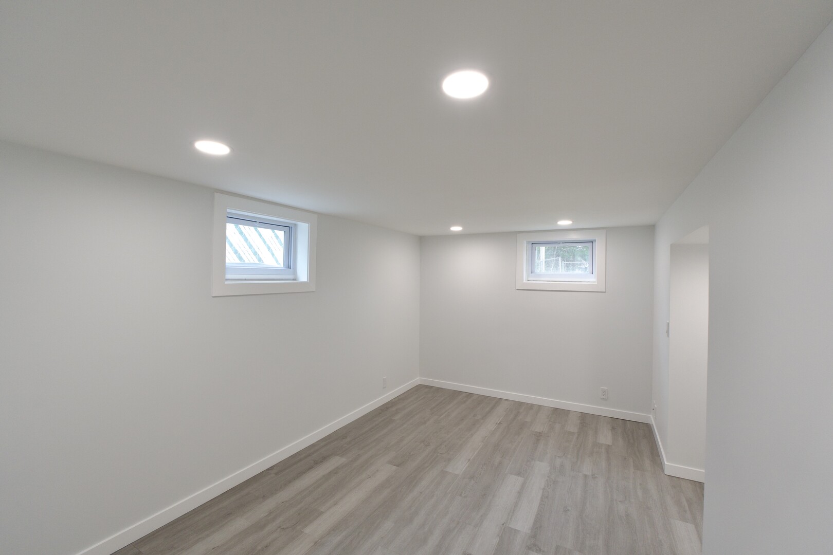1406 Ridgeway Street Round Lake Beach, IL 60073 - Photo 24 of 33 wooden floor in an empty room with a window