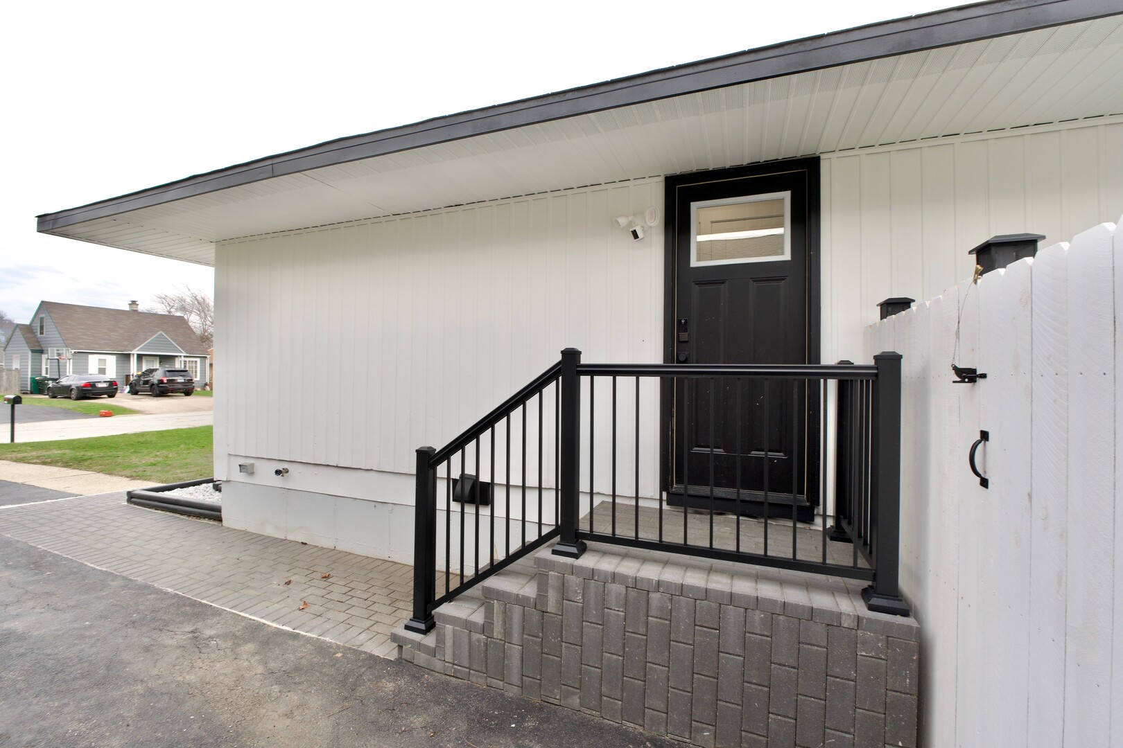 1406 Ridgeway Street Round Lake Beach, IL 60073 - Photo 33 of 33 a view of a porch with wooden floor