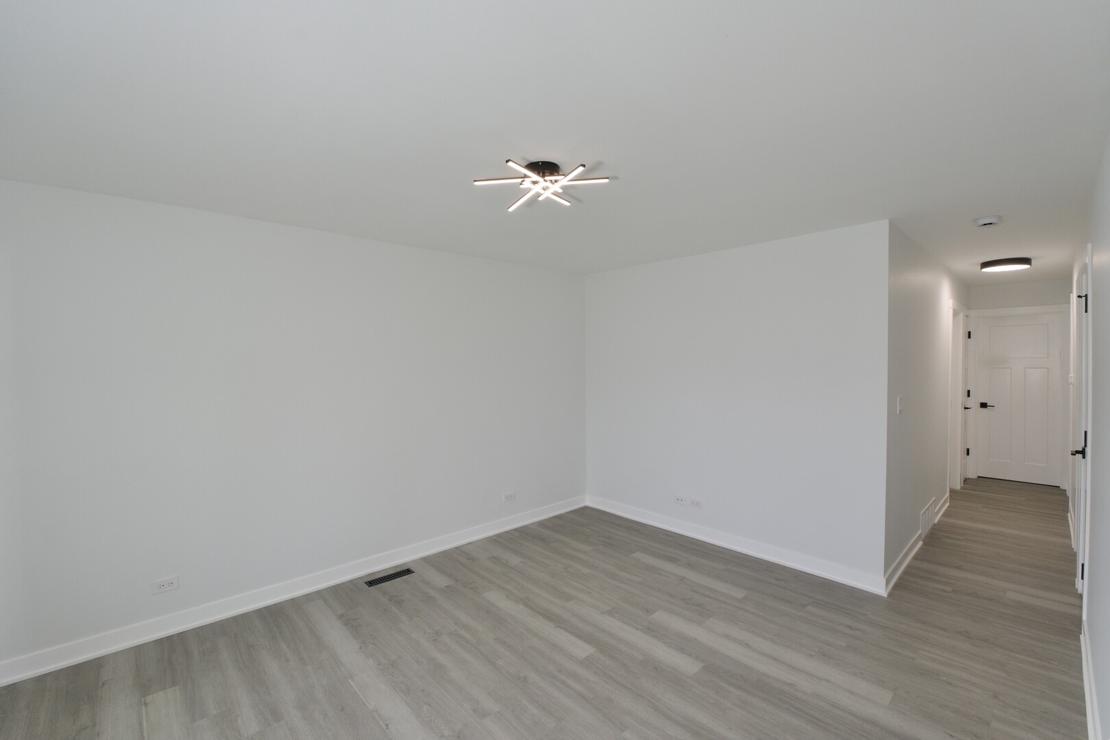 1406 Ridgeway Street Round Lake Beach, IL 60073 - Photo 10 of 33 wooden floor in an empty room