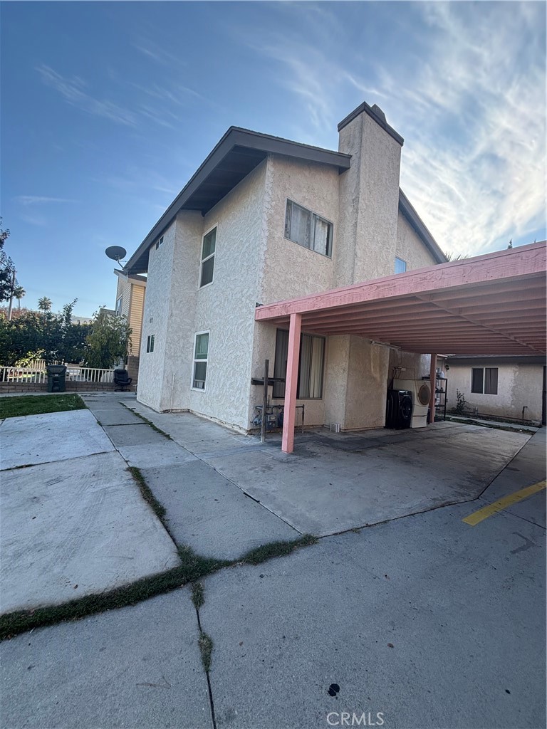 a view of a house with a yard and garage