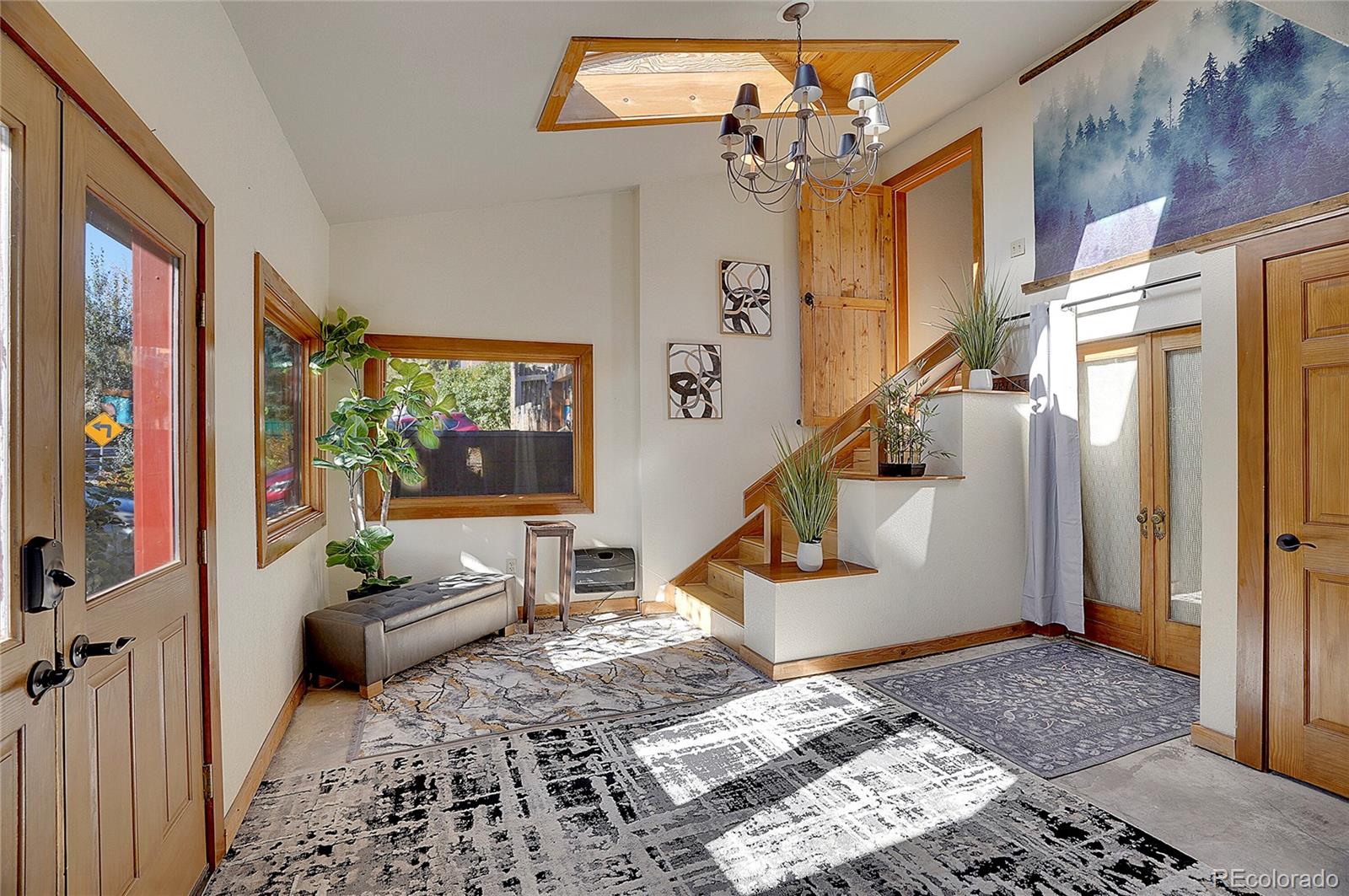 468 Riverside Drive Lyons, CO 80540 - Photo 2 of 50 a living room with furniture and a window