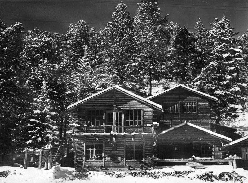 468 Riverside Drive Lyons, CO 80540 - Photo 49 of 50 a front view of a house with a yard