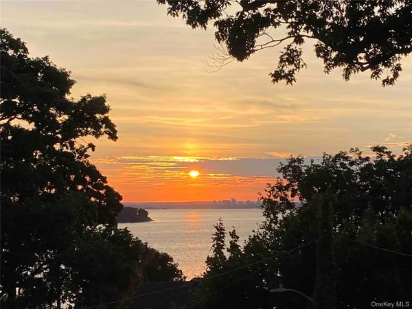 a sunset view with ocean view