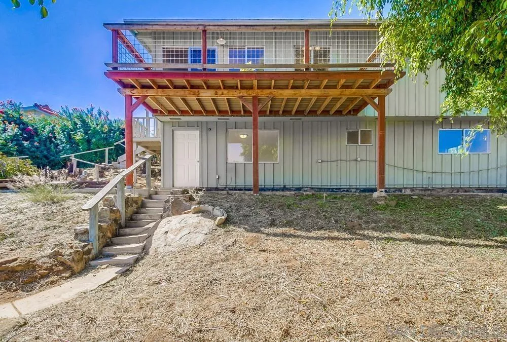 4276 Orchard Drive Spring Valley, CA 91977 - Photo 13 of 19 a front view of a house with a yard