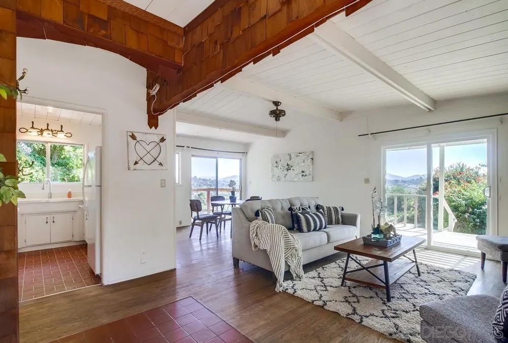 4276 Orchard Drive Spring Valley, CA 91977 - Photo 3 of 19 a living room with furniture and wooden floor