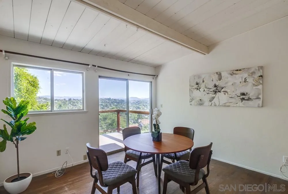 4276 Orchard Drive Spring Valley, CA 91977 - Photo 4 of 19 a view of a dining room with furniture window and wooden floor