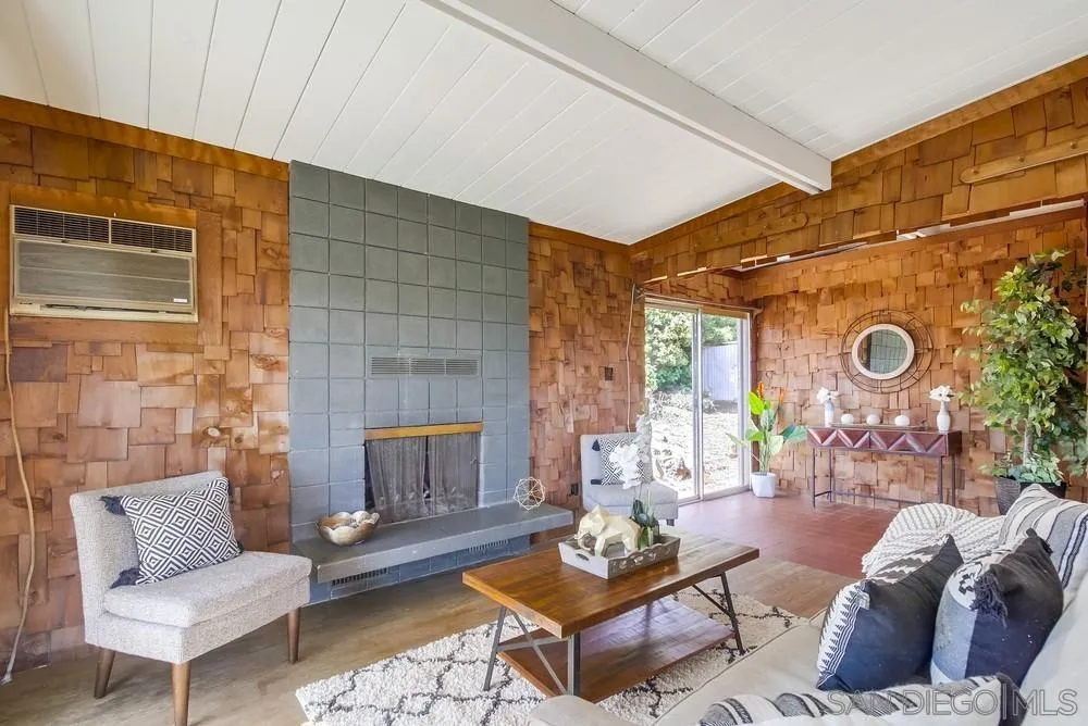 4276 Orchard Drive Spring Valley, CA 91977 - Photo 6 of 19 a living room with furniture and a fireplace