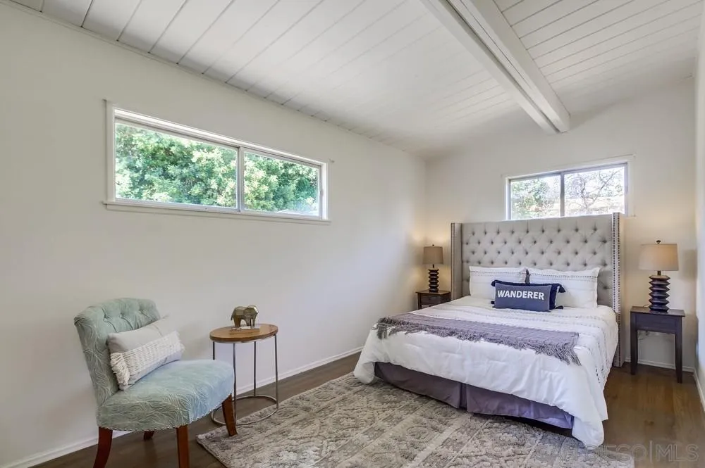 4276 Orchard Drive Spring Valley, CA 91977 - Photo 9 of 19 a bedroom with a bed and a chair