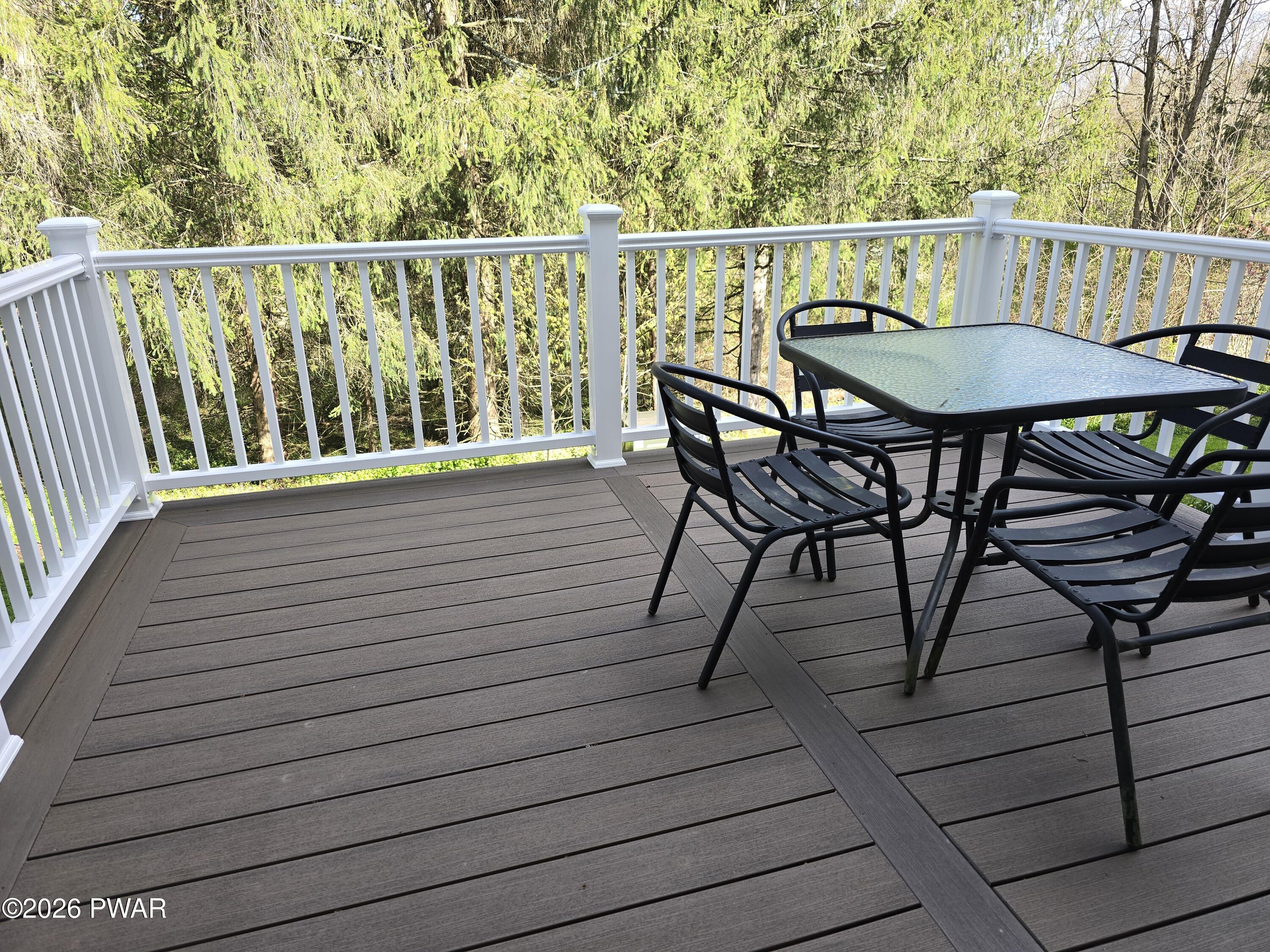107 Keystone Hls Road, Unit 404 Factoryville, PA 18419 - Photo 13 of 23 a view of a chairs on the roof deck
