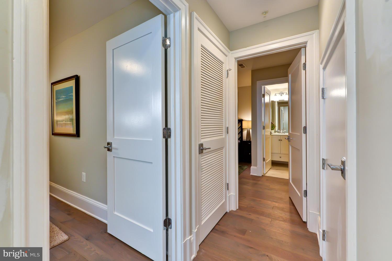 3921 Fulton Street Northwest, Unit 1 Washington, DC 20007 - Photo 8 of 25 a view of a hallway with a wooden door