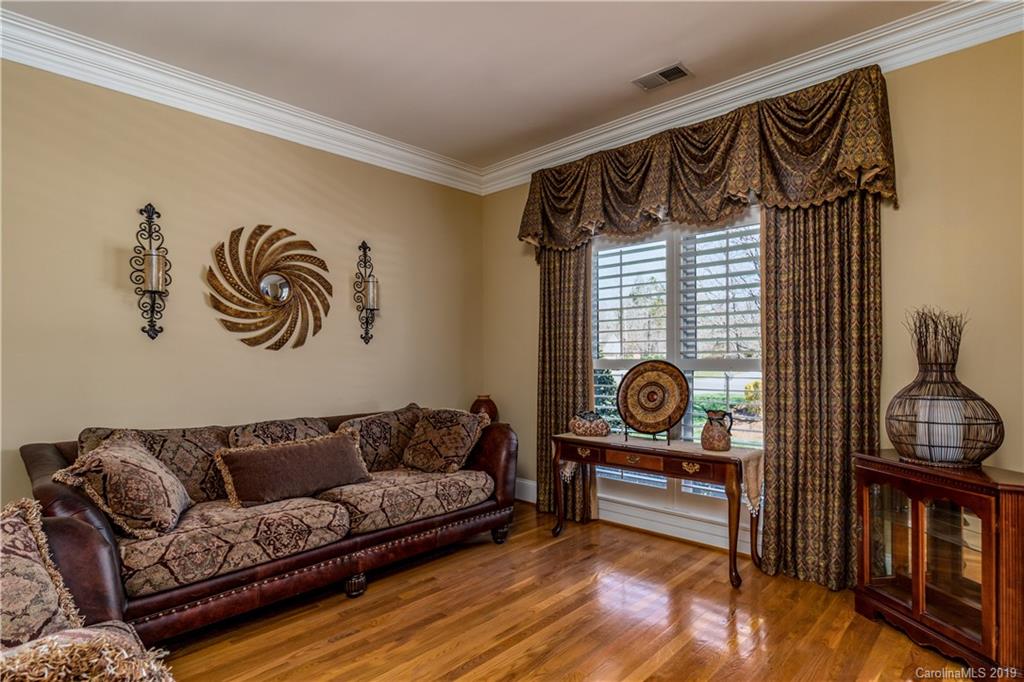3116 Rhett Butler Place Charlotte, NC 28270 - Photo 2 of 18 a living room with furniture and a window