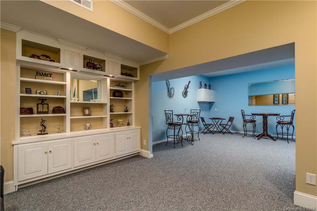 3116 Rhett Butler Place Charlotte, NC 28270 - Photo 15 of 18 a room with furniture and a large window