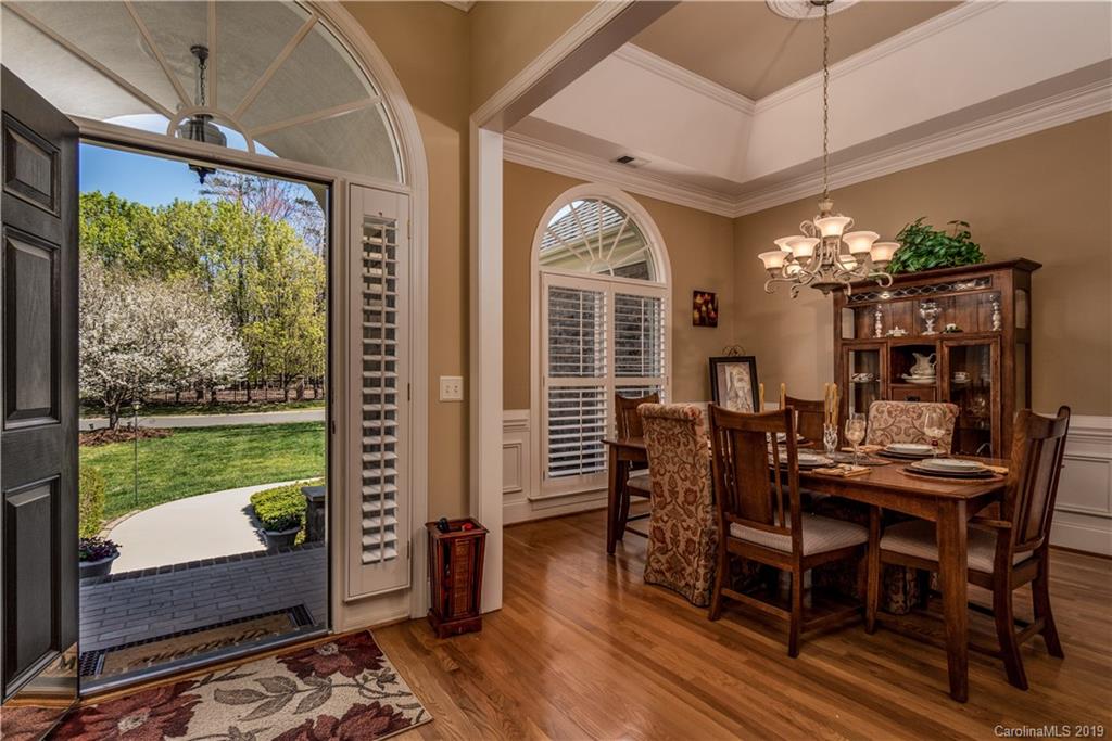 3116 Rhett Butler Place Charlotte, NC 28270 - Photo 3 of 18 a view of a dining room with furniture window and wooden floor