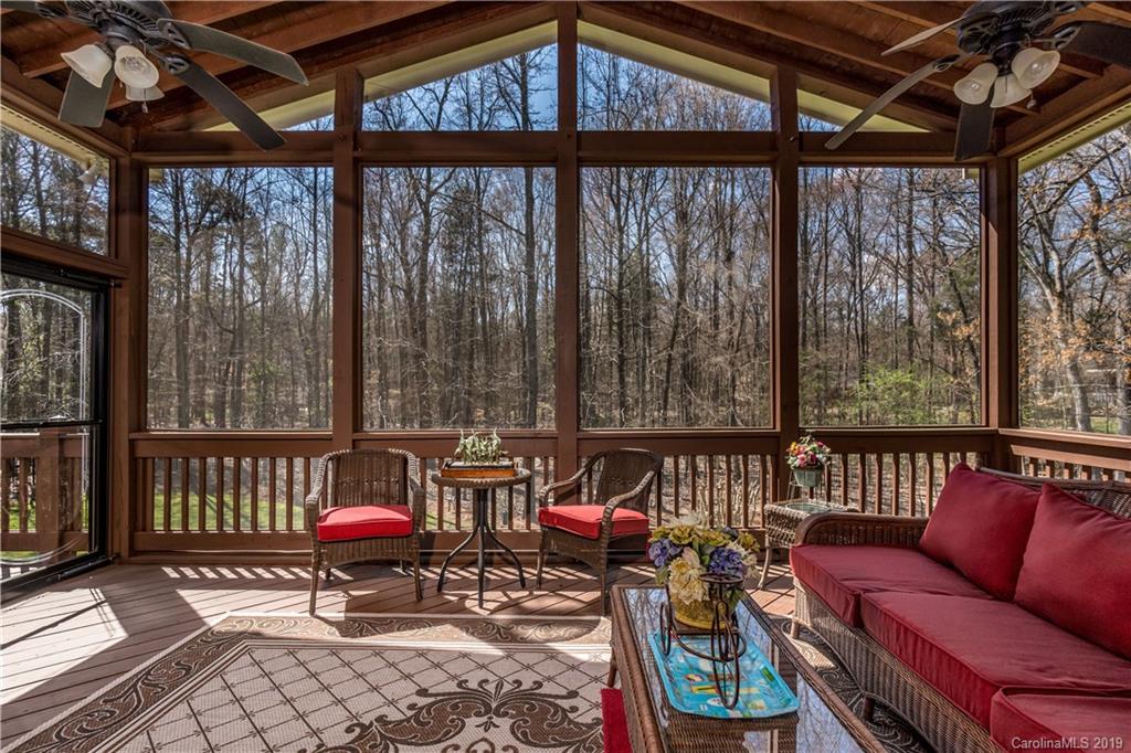 3116 Rhett Butler Place Charlotte, NC 28270 - Photo 7 of 18 a balcony with furniture and wooden floor