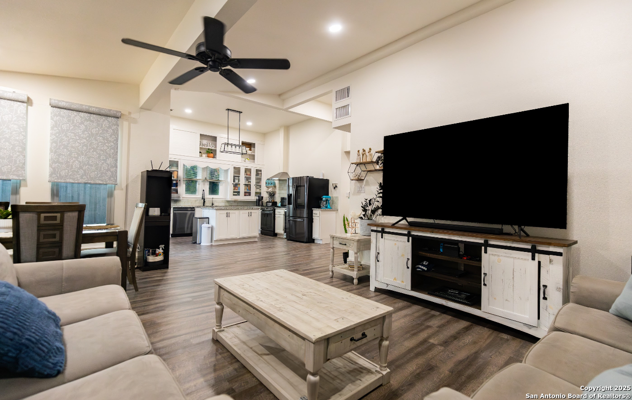 805 20th Street Hondo, TX 78861 - Photo 11 of 30 a living room with furniture and a flat screen tv
