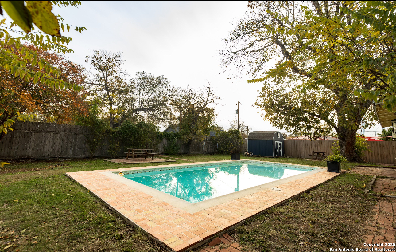 805 20th Street Hondo, TX 78861 - Photo 2 of 30 a view of swimming pool with a yard