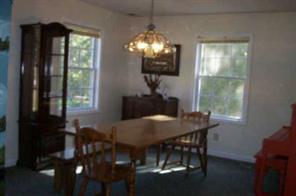 10104 Timberhitch Road Waxhaw, NC 28173 - Photo 4 of 8 a view of a dining room with furniture window and outside view