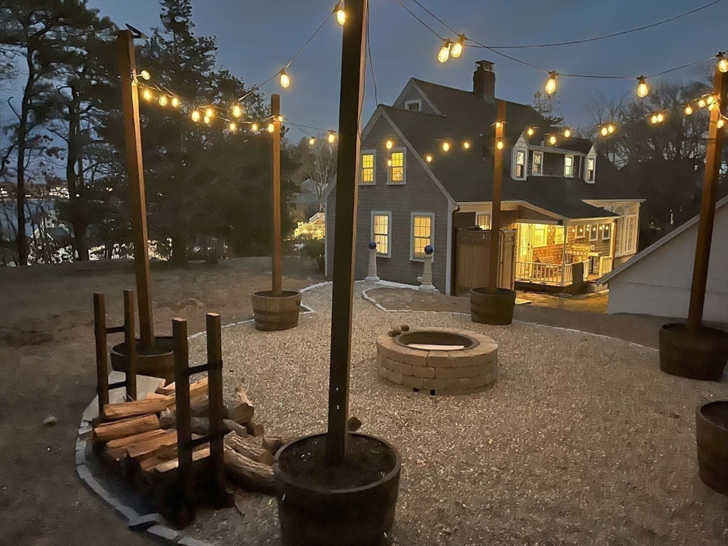 16 Jefferson Shores Road Wareham, MA 02532 - Photo 36 of 37 a room with lots of gym equipment and a chandelier