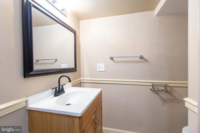 a bathroom with a bath tub