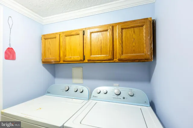 a backyard with wooden fence