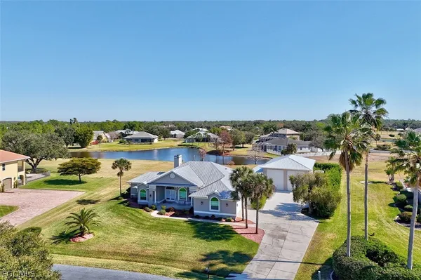 an aerial view of a house with a garden