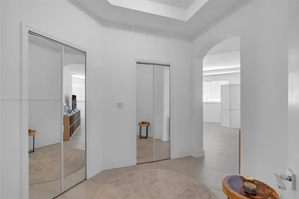 a spacious bathroom with a bathtub and shower