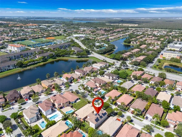a view of a golf course with a lake