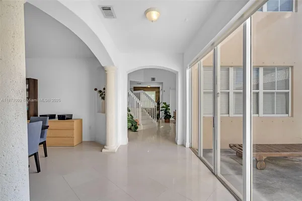 a view of livingroom with furniture and closet