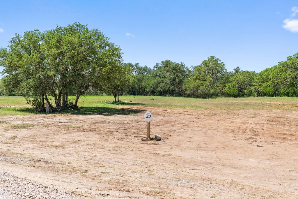 a fire hydrant in the middle of a field