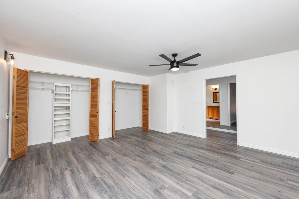 2513 Sarbonne Drive Oceanside, CA 92054 - Photo 13 of 55 wooden floor in an empty room with a window