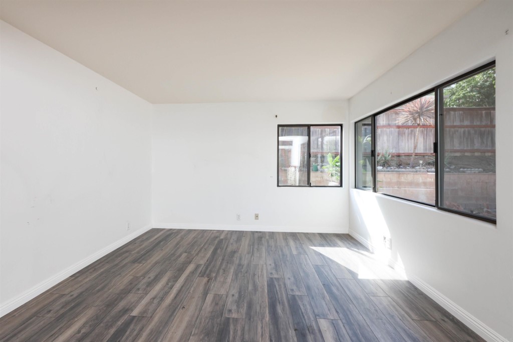 2513 Sarbonne Drive Oceanside, CA 92054 - Photo 21 of 55 wooden floor in an empty room with a window