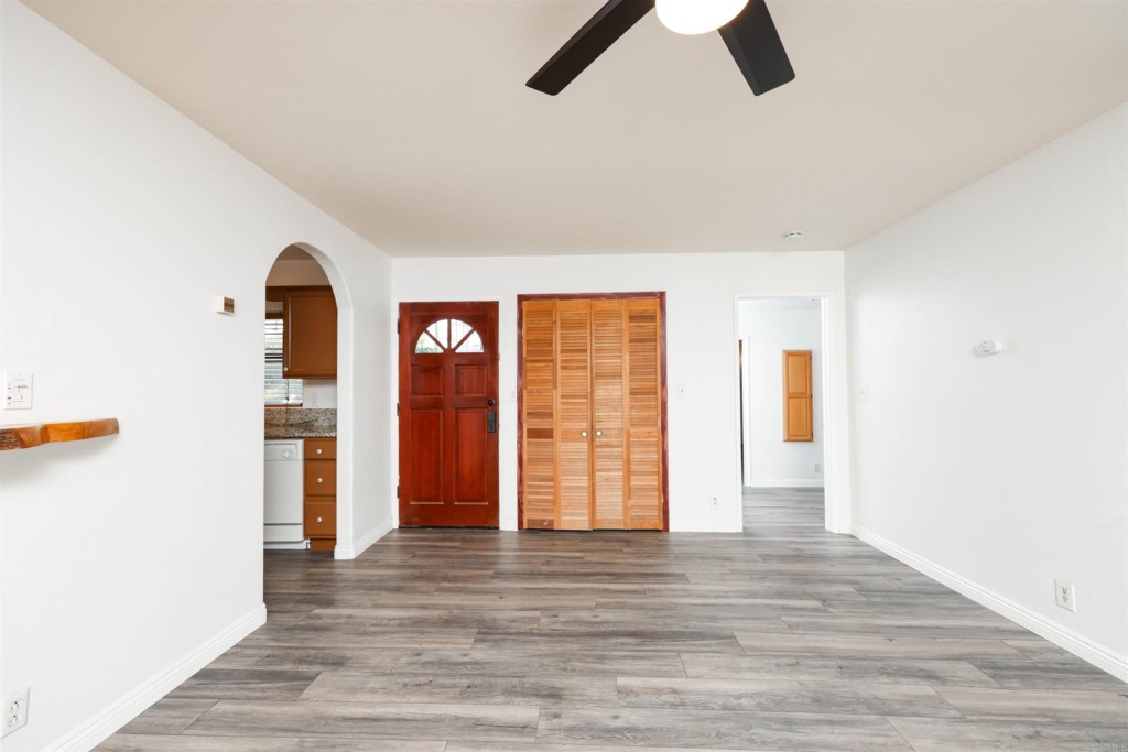 2513 Sarbonne Drive Oceanside, CA 92054 - Photo 24 of 55 a view of empty room with wooden floor