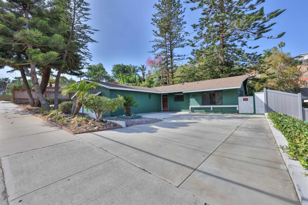 2513 Sarbonne Drive Oceanside, CA 92054 - Photo 3 of 55 front view of a house with a yard