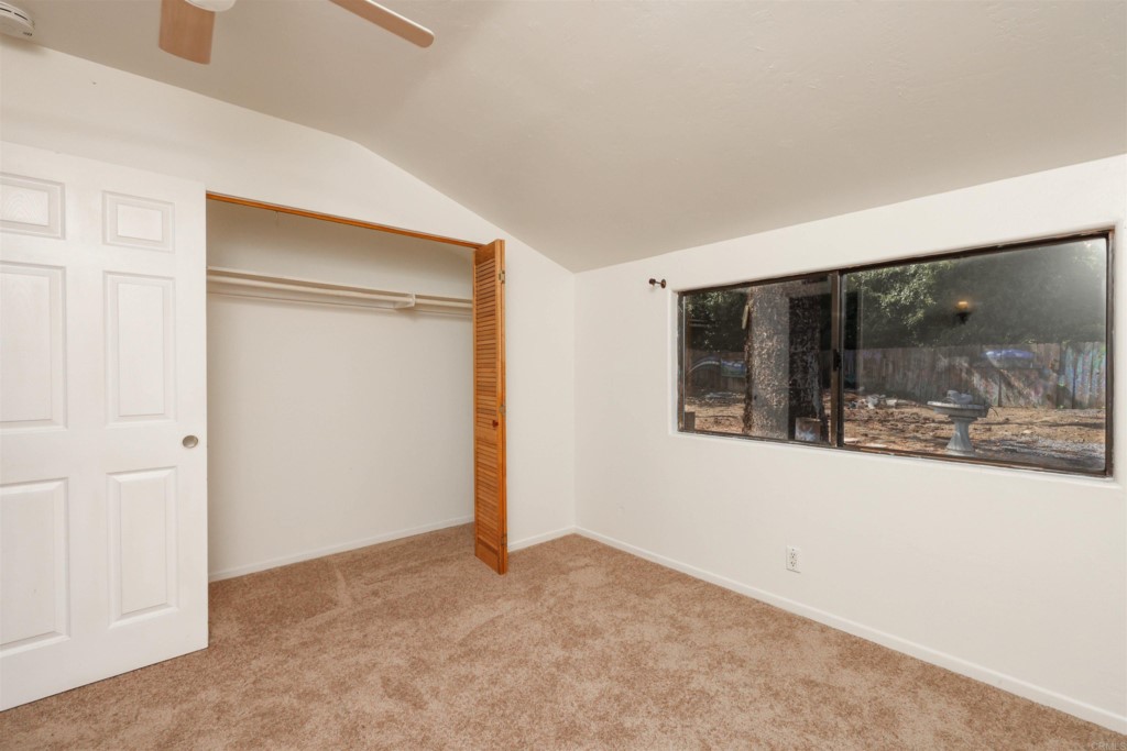 2513 Sarbonne Drive Oceanside, CA 92054 - Photo 39 of 55 an empty room with a window
