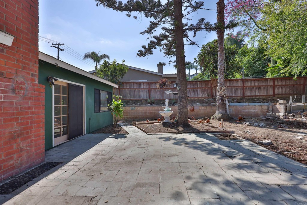 2513 Sarbonne Drive Oceanside, CA 92054 - Photo 41 of 55 a view of a chair and table in backyard