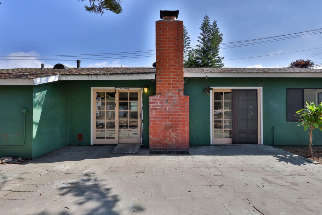 2513 Sarbonne Drive Oceanside, CA 92054 - Photo 43 of 55 a front view of a house with a yard