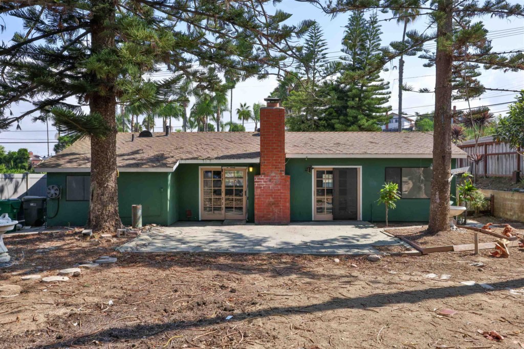 2513 Sarbonne Drive Oceanside, CA 92054 - Photo 51 of 55 a front view of a house with yard outdoor seating and barbeque oven