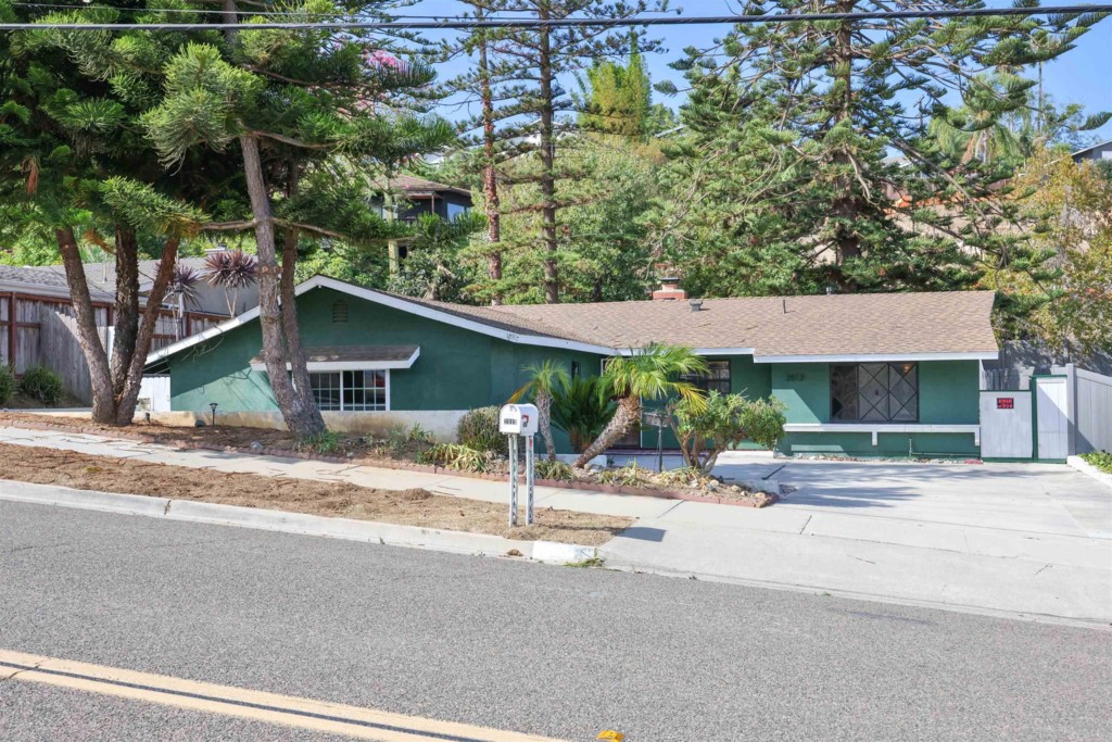 2513 Sarbonne Drive Oceanside, CA 92054 - Photo 7 of 55 a view of a house with a sink and yard